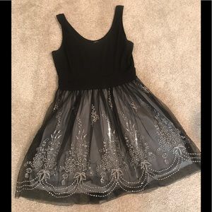 Black and lace dress with beading detail